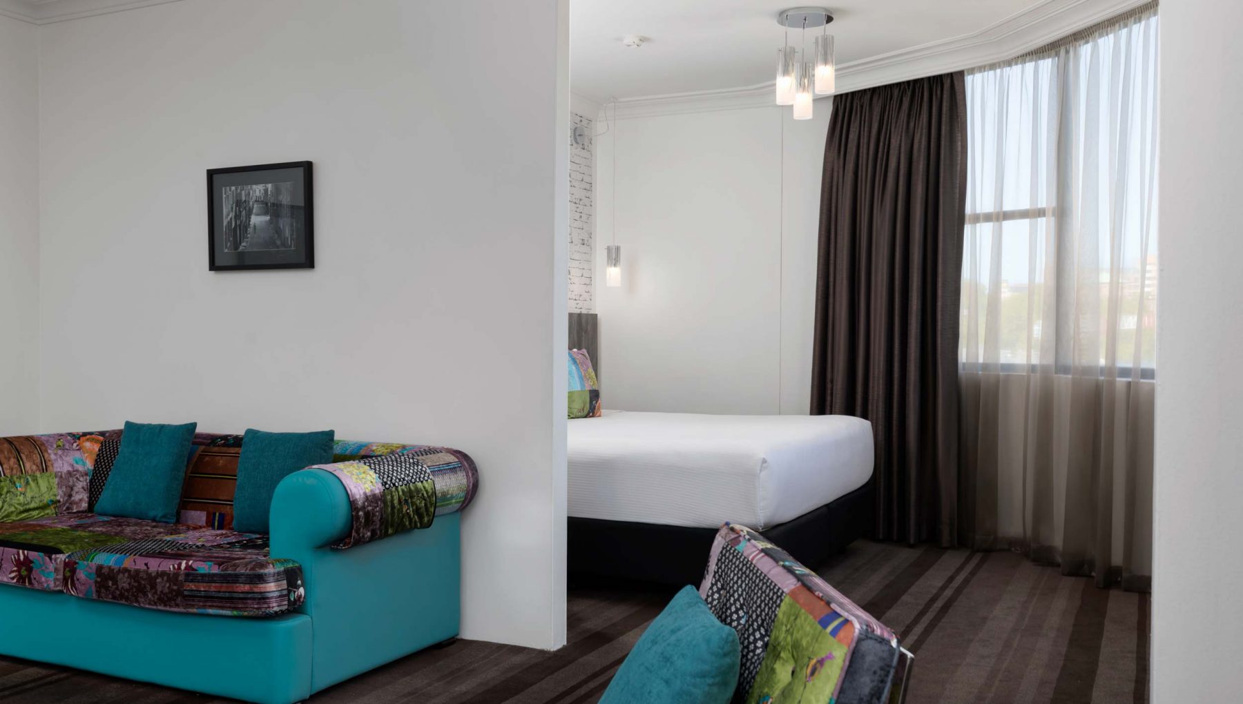 Rydges Sydney Central - Executives Suites - Bedroom and Living Room